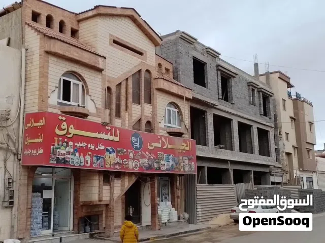 منزل تجاري سكني قرجي ع الطريق