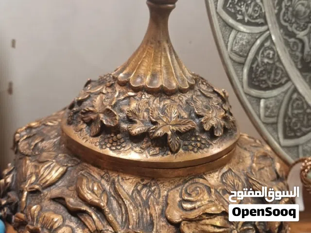 Handmade copper dish with embossed flowers