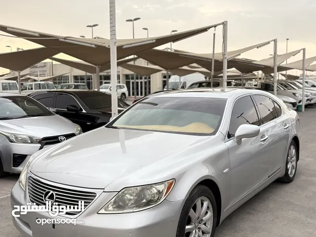 Lexus LS460 GCC 2010, Full Option. Silver exterior with saffron (tan) interior