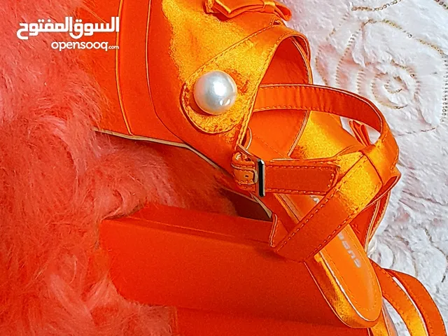 Orange With Heels in Madaba