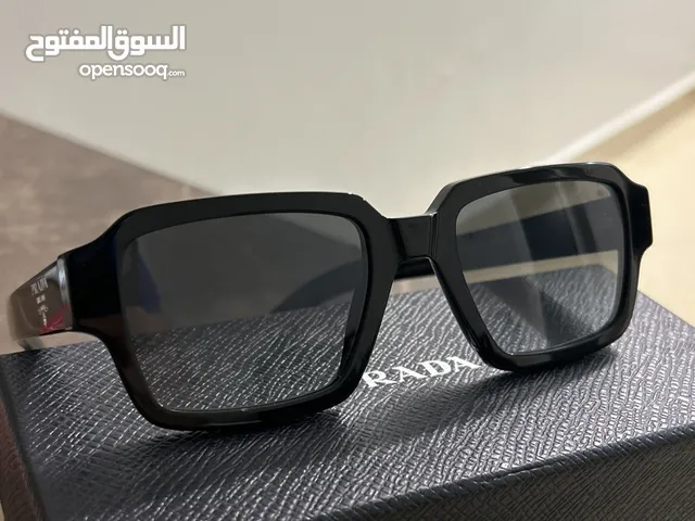 Authentic Prada designer sunglasses-like new condition worn twice- no case included- luxury eyewear.