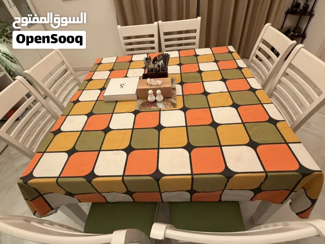 Solid wooden dining table and chairs
