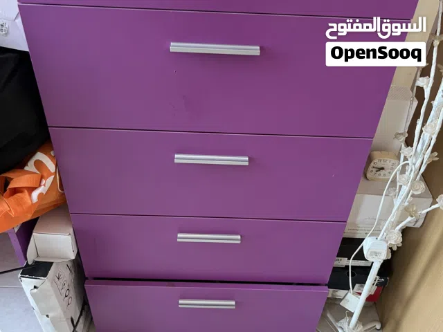 Purple color cupboard storage with 5 drawers