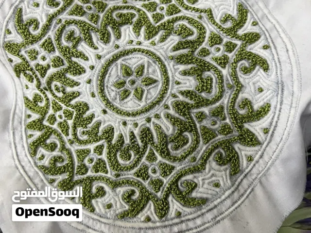كمة عُمانية فاخرة مطرزة يدويًا بـ غرزة العقدة