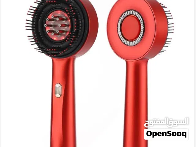 فرشاة تدليك فروة الرأس الالكترونية.