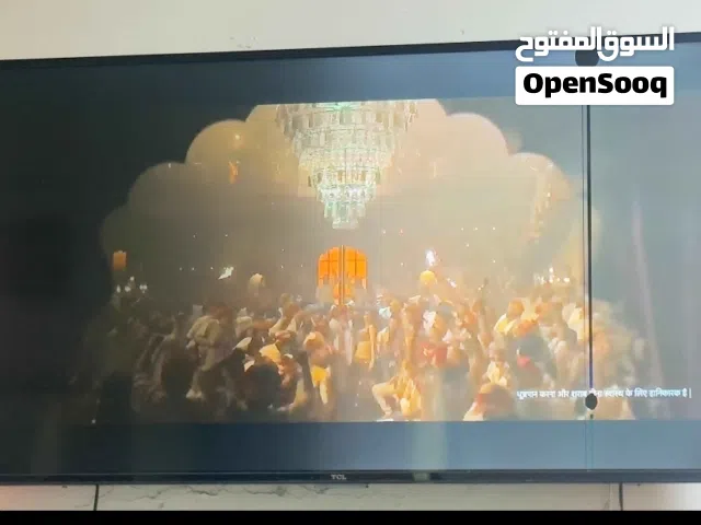 SMART TV TCL BRAND FORSALE IT HAS ONE BLACK LINE ON SCREEN AS YOU CAN SEE BUT WORKS PERFECTLY FINE