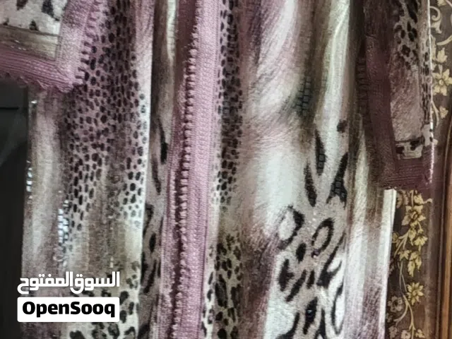 قفطان استعمال مرة واحدة