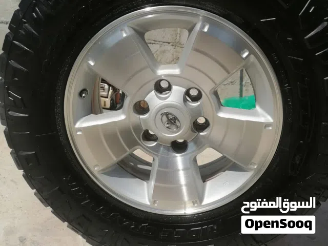 اطارات مع رنجات اصليه أمريكيه ممتازه جدا