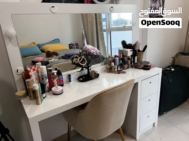 Bed and dressing table and side table