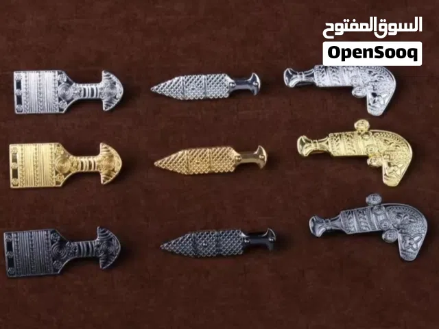 علامة الخنجر العماني للدشداشة
