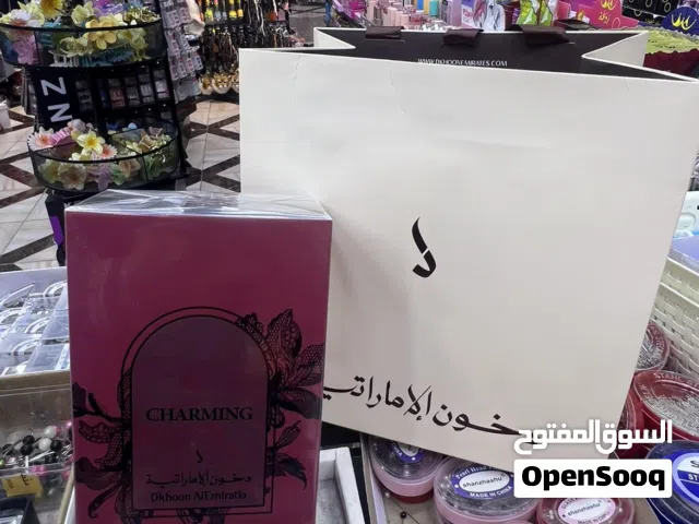 عطر من شركة دخون  الإماراتية  الاصليه من نوع شارمينج جديدة مع الكيس