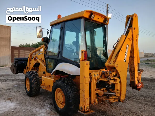حفار عقرب X2 موديل 2007خادم 215 ساعه استيراد اروبا في ليبيا مش خادم