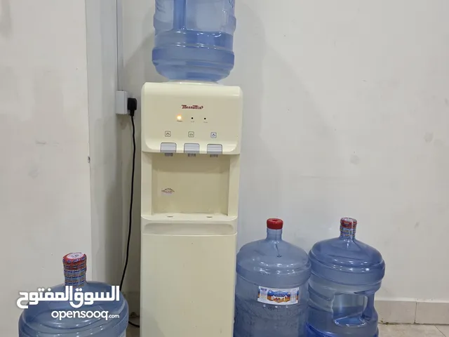 Water dispenser with 4 Almanhal/Nestle water bottles-30 BD