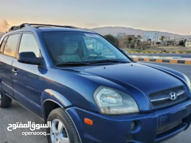 ابحث لشراء سيارة توسان من 2008الئ2010اربعه بستون بترول