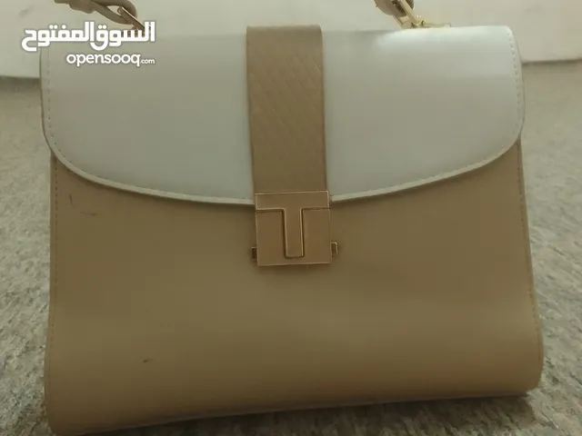 حقيبة نسائية أنيقة من ماركة CHRISTINE &OLK اصلية مستعملة بحالة ممتازة للبيع