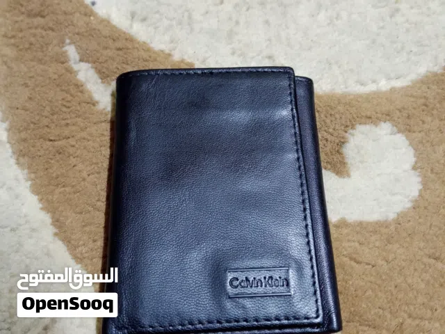 محفظة رجالية ثلاثية الطيات (Trifold Wallet) من ماركة كالفن كلاين (Calvin Klein) جلد اصلي طبيعي 100 ٪