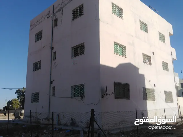  Building for Sale in Al Karak Al-Qasr