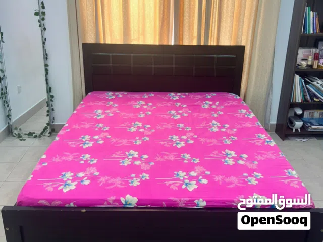 Queen Bed with mattress and pillow