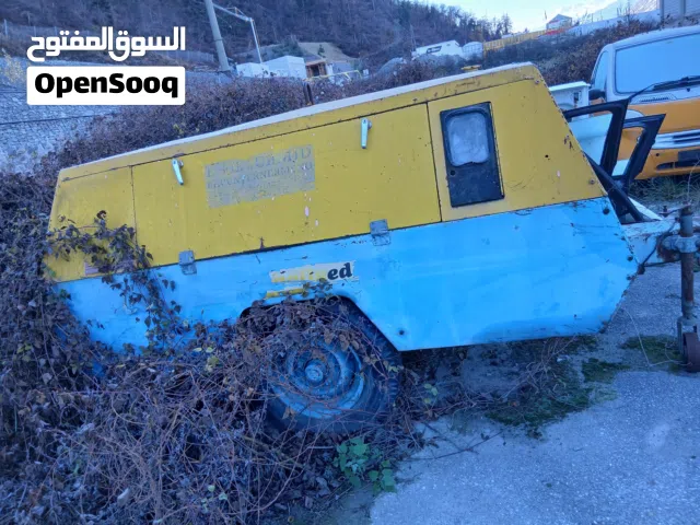 كمبروسر 4 بستون محرك سازوكي