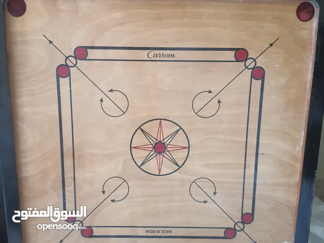carrom board and its accessories