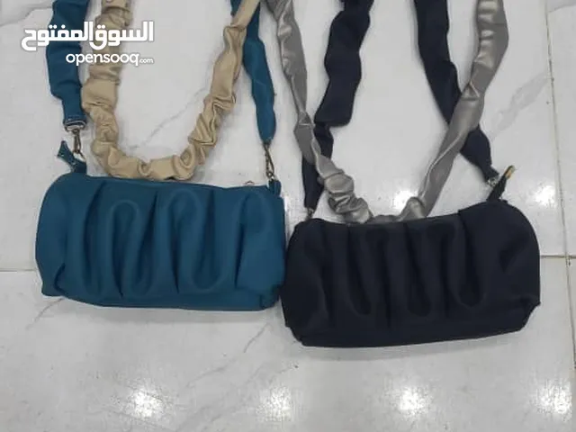 محلات الماجد للشنط