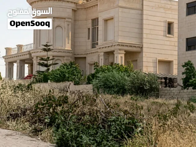 أرض في موقع مميز ضاحية الرشيد