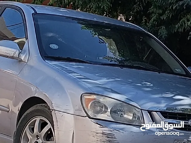 Kia2006 لون فضي ملكي