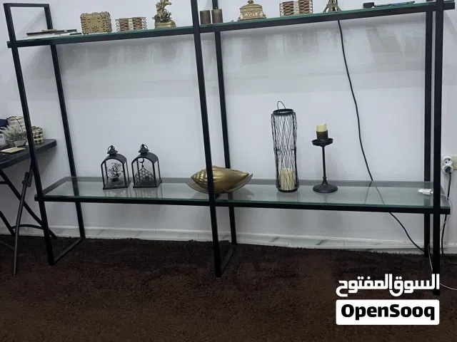 رف حديد و رفوفه زجاج