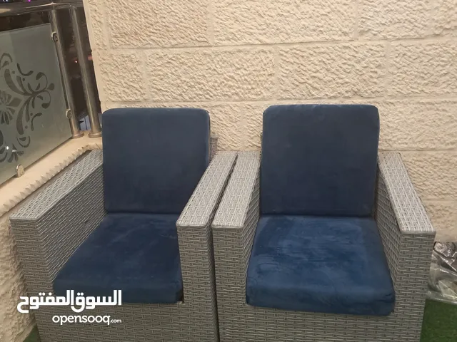 طقم راتان لون سكني وفرش كحلي