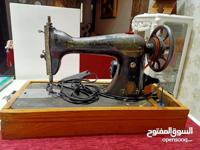 مكنة خياطه سنجر
