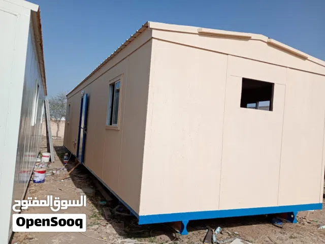 Refurbished plywood portacabin with two rooms, 1 toilet and 1 pantry