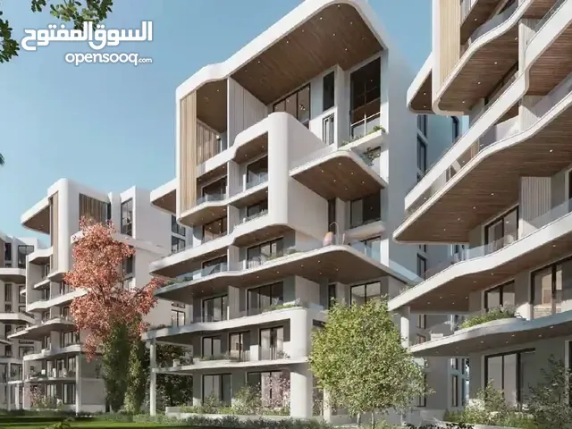 شقه للبيع في قلب التجمع الخامس بجوار الجامعه الامريكيه بقسط يصل الي 12سنه