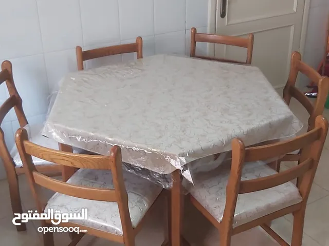 طاولة سفرة مع 6 كراسي خشب بلوط