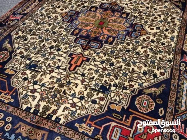 سجادة إيرانية يدوية الصنع عمرها 30 عامًا
