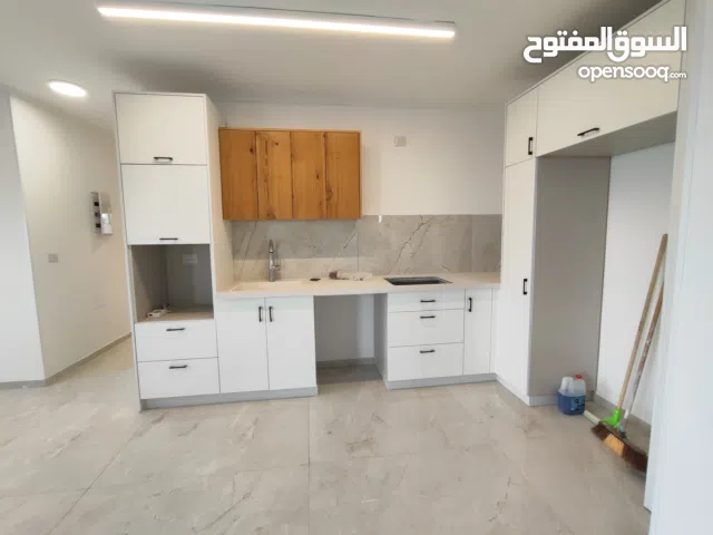 شقة جديدة غير مفروشة للايجار أول رافات دوار المهندس