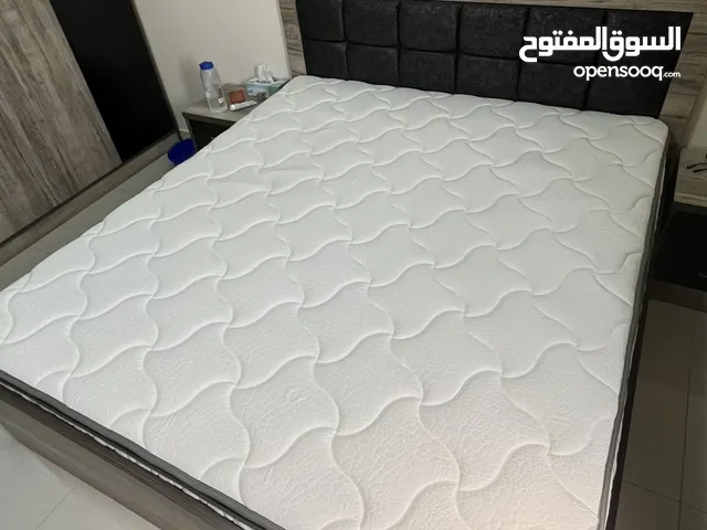 Medicated mattress with memory form topper