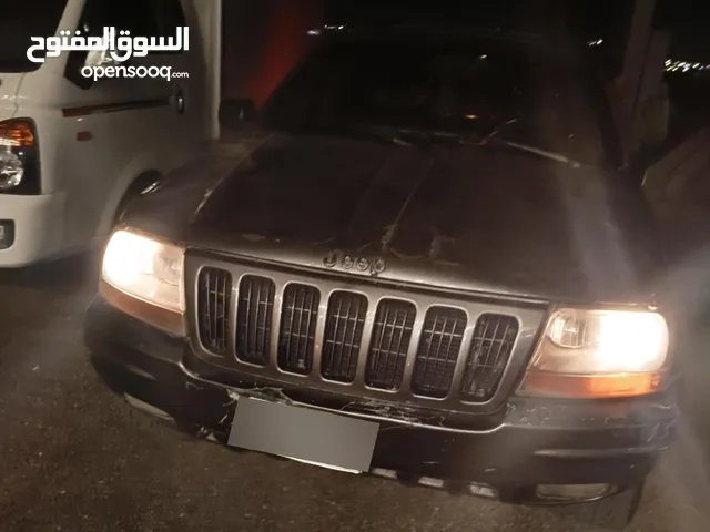 مواصفات جيب شروكي 1999