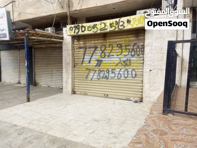 محل تجاري طابقين على الشارع الرئيسي مدخل الكراجات بجانب مطعم تكرم عينك للايجار مساحته 5/16 الطابق1و2