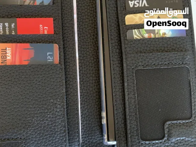 محفظة جلد كبيرة وتتسع لموبايل جديدة