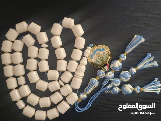 مسباح دامنا على شعار الكويت