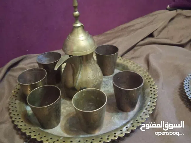 الرجاء قراءه الاعلان قبل الاتصال طقم شاي مع  فناجين وطقم دله قهوه مع فناجين نحاس نحاس