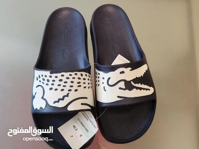 Lacoste branded black and white women's slippers, original and high quality for sale