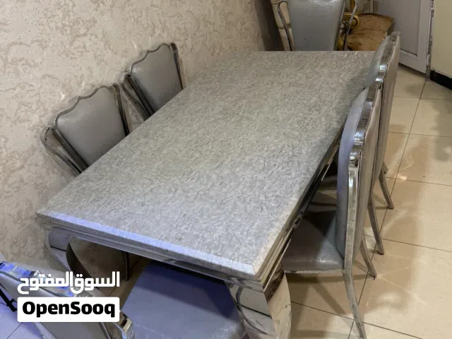 طاولة طعام  سانلس ستيل6 كراسي ومرمر ثقيل