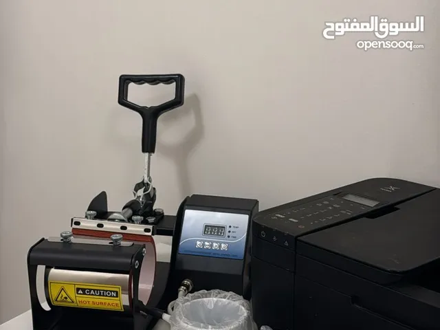مكبس الاكواب مع طابعه canon والاكواب