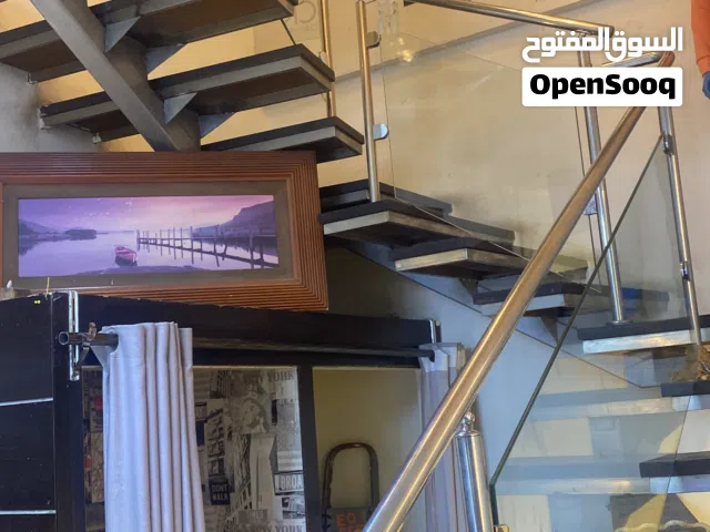 ديكور محل ملابس رجالي