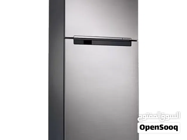 A Samsung top-mount refrigerator with Twin Cooling Plus technology.