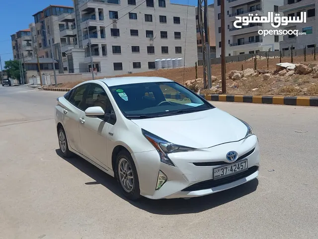 تويوتا بريوس لون ابيض لؤلؤي 2018 فحص 3 جيد بسعر مغري قابل للبدل