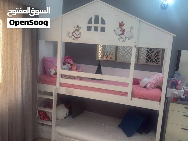 Kids double bed very clean 2 Mattress   Purchase price 380 BD  White color rarly used with slider