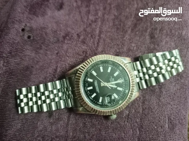 ساعة رولكس شغال بصراحه لا اعلم علي كبي او ارجنل او شو بزبط للبيع بسعر رمزي يوجد فيها تاريخ وشغال بقل