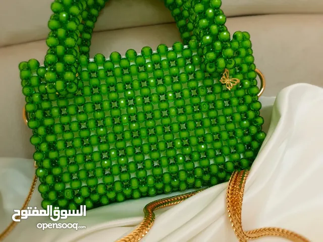 Green beaded handbag